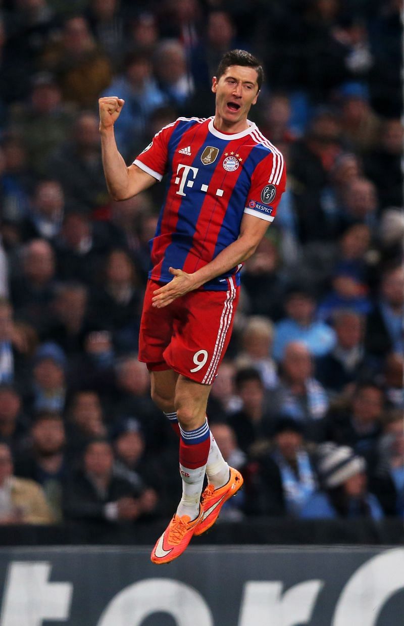 Robert Lewandowski is ecstatic after scoring one of his goals against Wolfsburg.